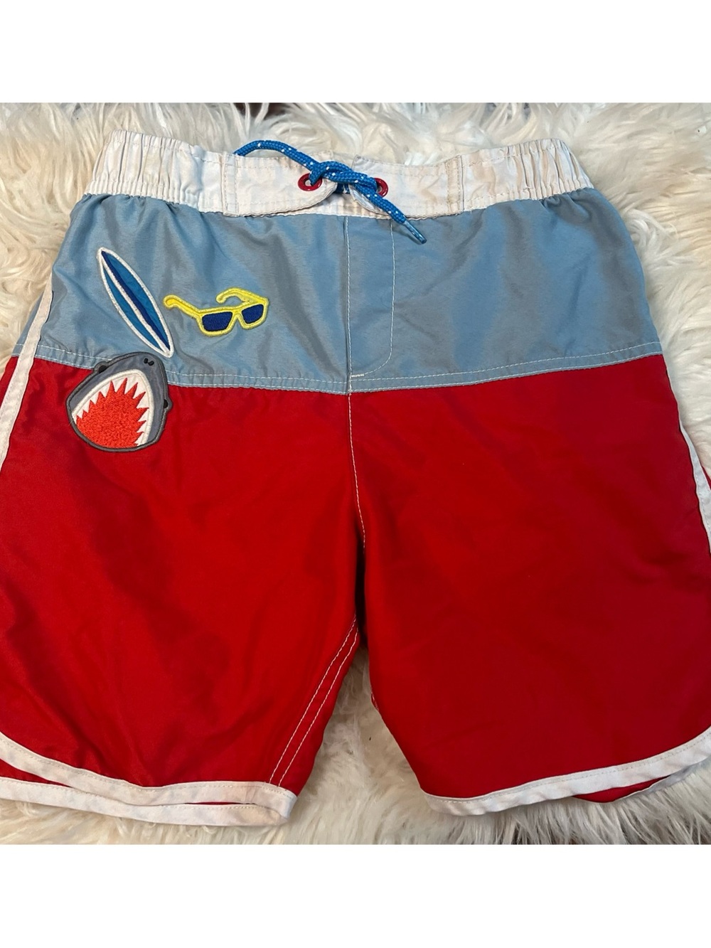 Mini boden swim trunks